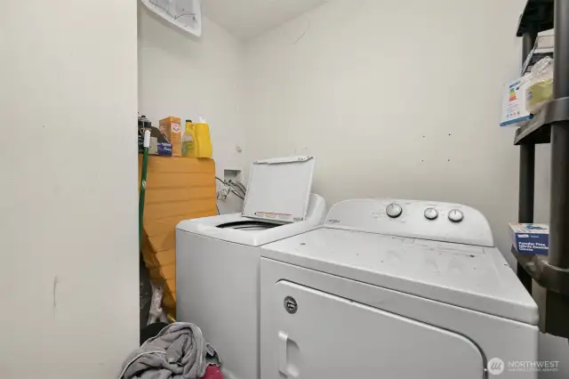 Laundry in both units (lower unit laundry shown in photograph).