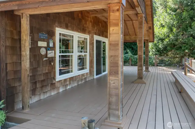 Ramp approach to deck, covered porch and slider doors.