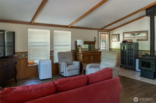Looking towards front door. Kitchen is behind. Hallway w/2bed 2bath to the right.