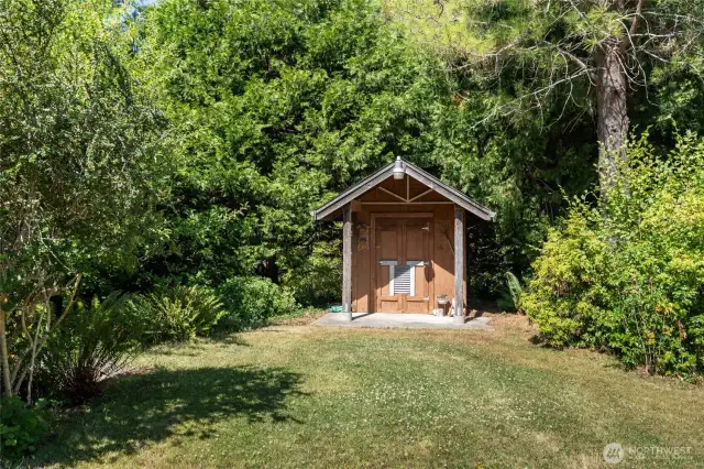 Adorable pumphouse with storage! This property has a lovely variety of mature trees and shrubs, all planted with love by the owners.