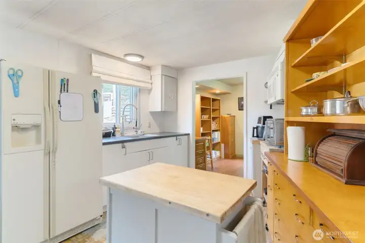 Kitchen space next to dining room