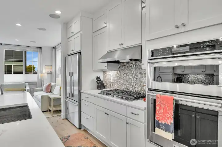 Designer tile accents were added since purchase.