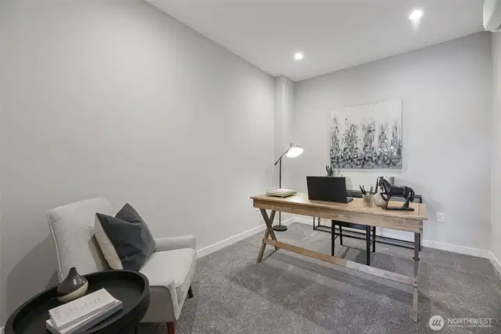 Man Floor Den. Pictures depict a previously built home similar to the home going to be built on this lot. Floor plans, Elevations, colors, upgrades & materials may be different.