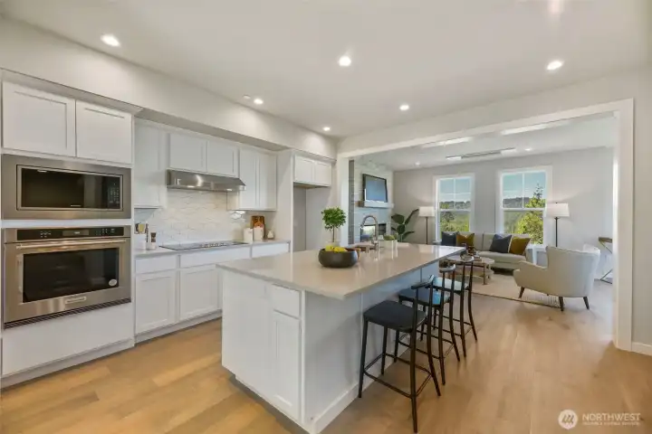 Kitchen. Pictures depict a previously built home similar to the home going to be built on this lot. Floor plans, Elevations, colors, upgrades & materials may be different.
