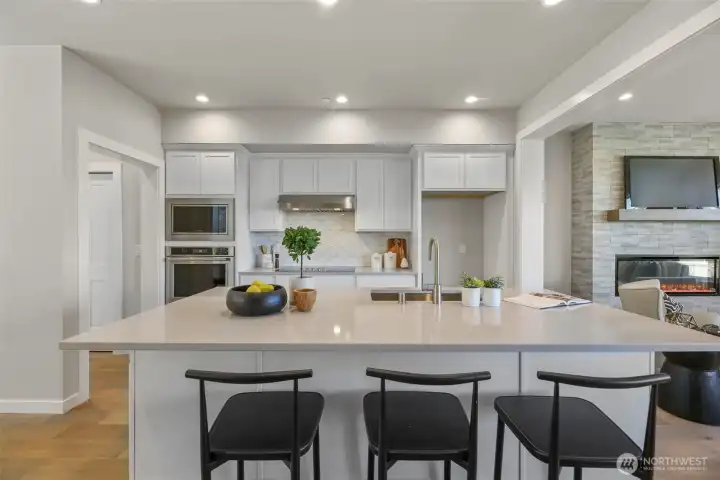 Kitchen. Pictures depict a previously built home similar to the home going to be built on this lot. Floor plans, Elevations, colors, upgrades & materials may be different.