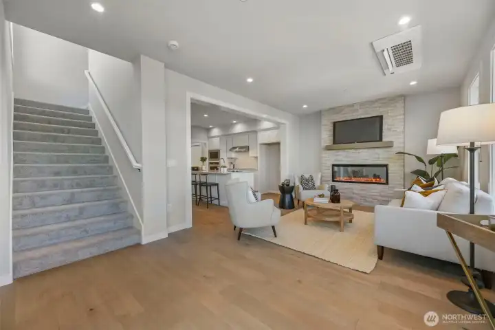 Family Room. Pictures depict a previously built home similar to the home going to be built on this lot. Floor plans, Elevations, colors, upgrades & materials may be different.