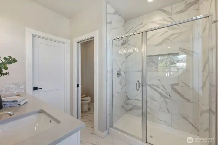 Primary Bathroom. Pictures depict a previously built home similar to the home going to be built on this lot. Floor plans, Elevations, colors, upgrades & materials may be different.