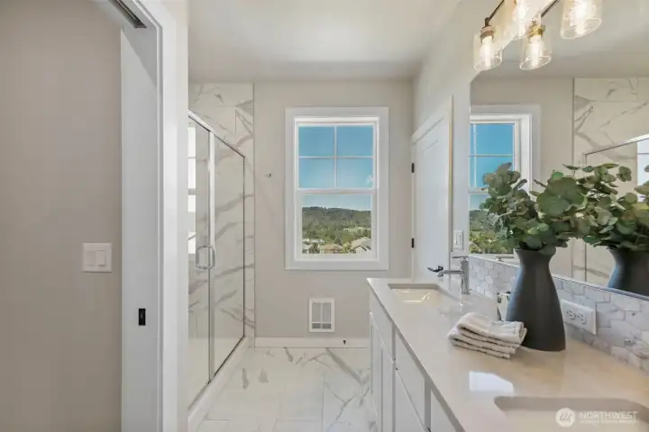 Primary bathroom. Pictures depict a previously built home similar to the home going to be built on this lot. Floor plans, Elevations, colors, upgrades & materials may be different.