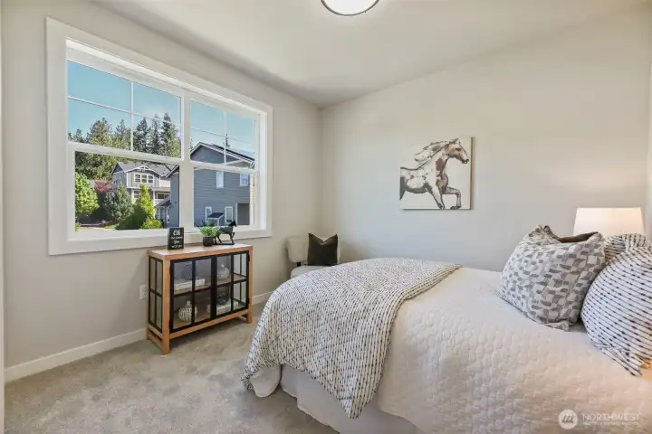 Bedroom 2. Pictures depict a previously built home similar to the home going to be built on this lot. Floor plans, Elevations, colors, upgrades & materials may be different.