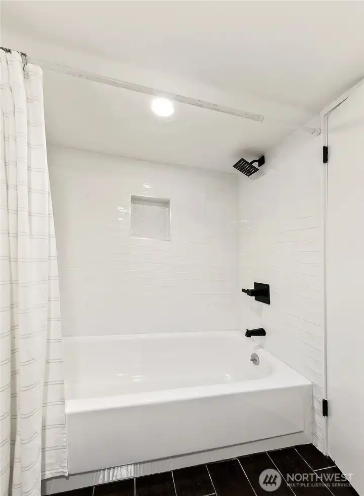 Refreshed shower on the lower level