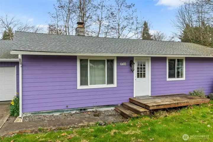 Bright paint and a newer roof to protect your investment.