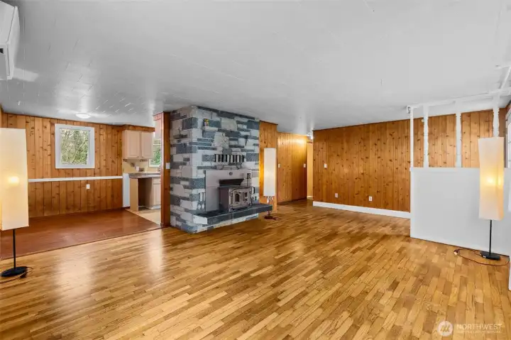 Wood stove central to to the home, keeps it warm and cozy.