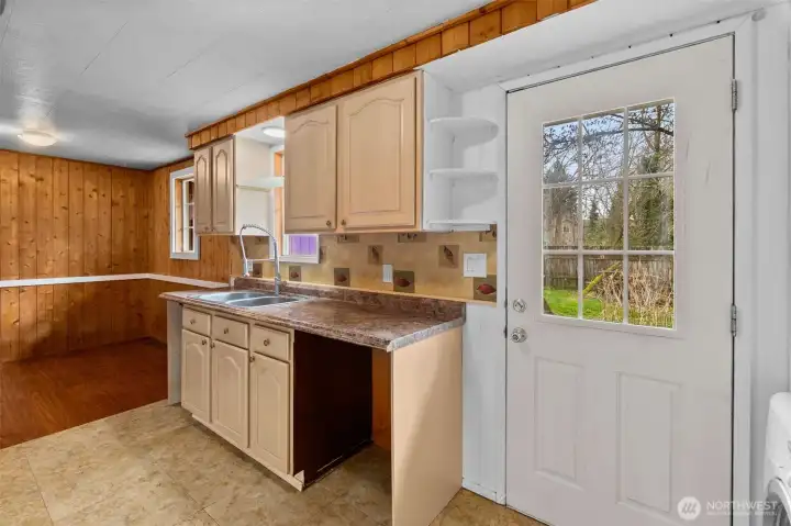 Backdoor off kitchen.