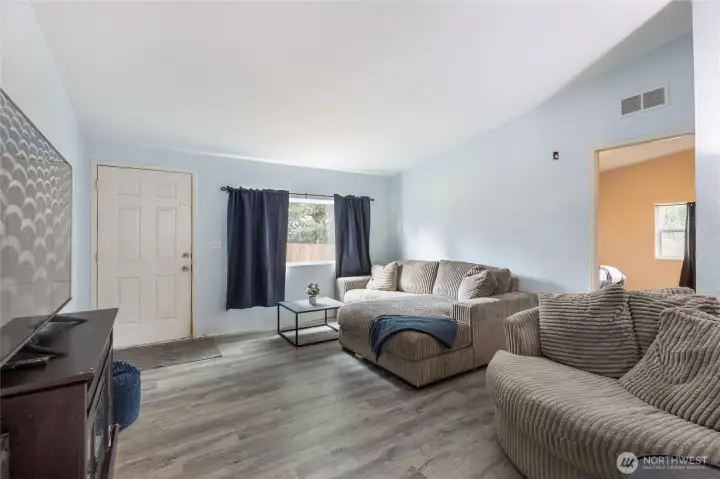 Bright living room filled with natural light.