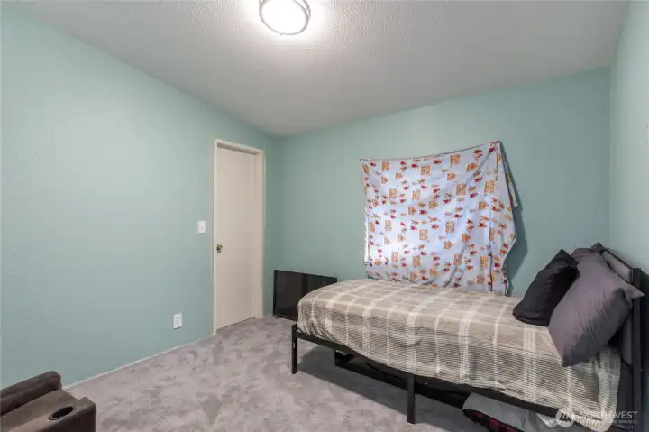 Third bedroom – comfortable and versatile space.