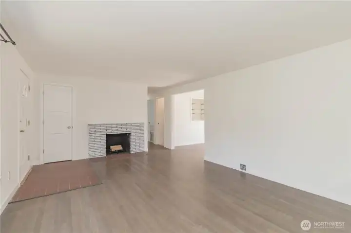 Living room with wood burning fireplace