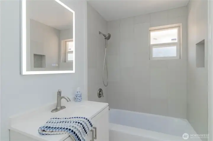 All new renovated bathroom with fun digital mirror