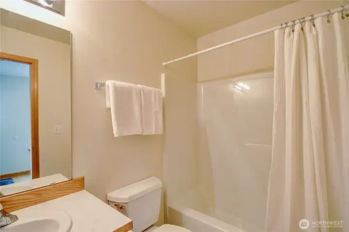 Main bathroom off of entrance and next to 2nd bedroom.
