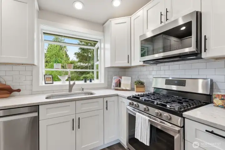All stainless steel appliances stay with the home, including washer & dryer.