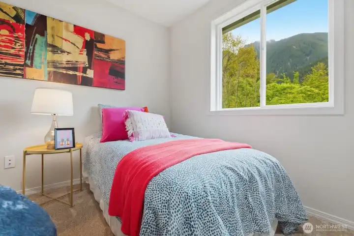 Bright third bedroom with closet, fresh paint, and brand-new carpet.