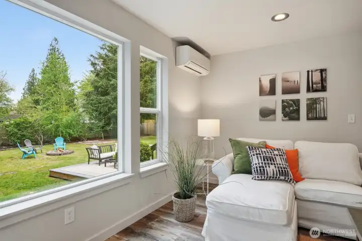 Abundant large windows throughout the home create a bright, light-filled atmosphere in every room.
