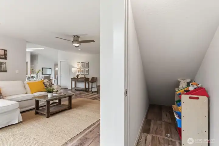 Stairs off the family room (with large under the stairs storage) lead to a spacious flex/bonus room.
