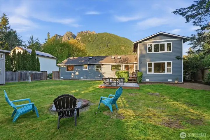 The expansive backyard provides endless possibilities—perfect for recreation, entertaining, and creating even more garden space.