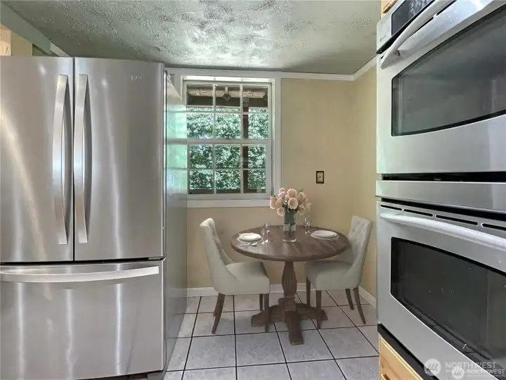 Virtually stage breakfast nook with S/S appliances Virtually stage breakfast nook with S/S appliances