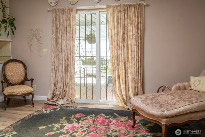 This space is perfect for a dining room, extra living room or office and has it's own entry to the outdoor patio and backyard. This space is perfect for a dining room, extra living room or office and has it's own entry to the outdoor patio and backyard.