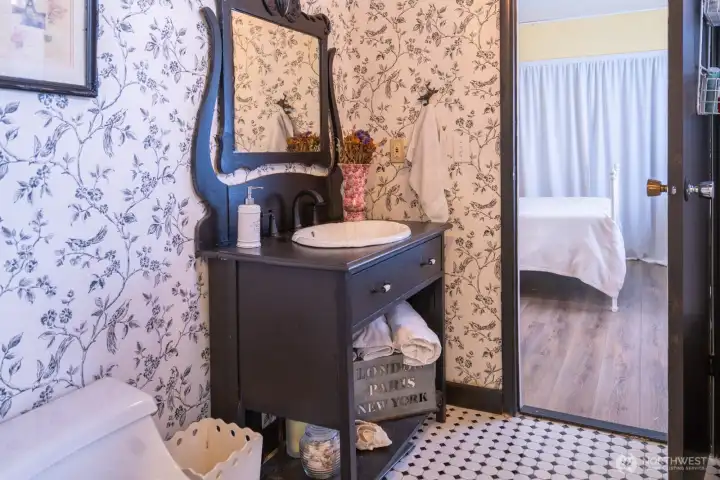 Second bathroom complete with a walk in shower. Second bathroom complete with a walk in shower.