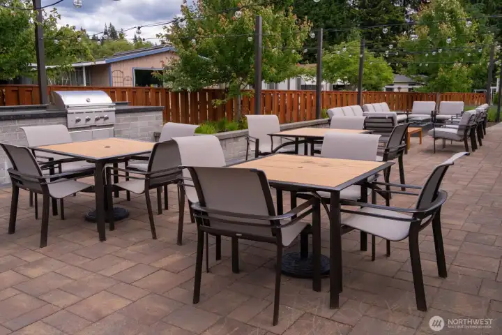 Community outdoor space complete with tables for all to enjoy. Community outdoor space complete with tables for all to enjoy.