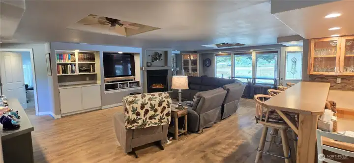 Living room with plenty of light from front porch windows