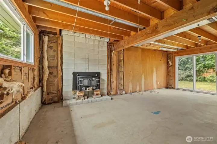 Unfinished Lower Level with Fireplace. Unfinished Lower Level with Fireplace.