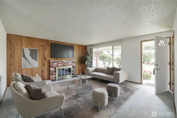 Walk into the spacious living room surrounding the fireplace, all new carpets. Walk into the spacious living room surrounding the fireplace, all new carpets.
