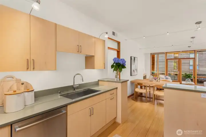 The chef can easily chat with guests, yet the guests don’t see any mess thanks to slightly-elevated counters with smart hidden storage. The chef can easily chat with guests, yet the guests don’t see any mess thanks to slightly-elevated counters with smart hidden storage.