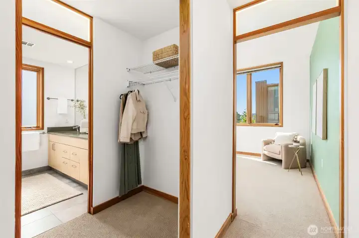 Here, we look from the entry of the primary suite into the bedroom, and see how it connects nicely with the primary closet and bathroom. Again, note the lighted transom windows above the doors, which create a warm, soothing glow to the interior spaces…so much cooler than a nightlight. Here, we look from the entry of the primary suite into the bedroom, and see how it connects nicely with the primary closet and bathroom. Again, note the lighted transom windows above the doors, which create a warm, soothing glow to the interior spaces…so much cooler than a nightlight.
