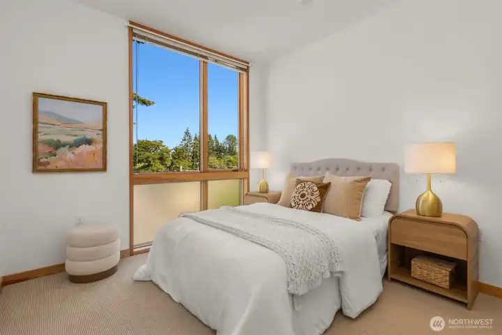 The 2nd bedroom’s windows provide wonderful east light. The 2nd bedroom’s windows provide wonderful east light.