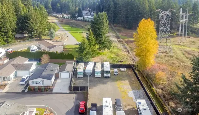 This aerial view shows the Onsite, community RV parking lot. This is provided for a monthly fee depending on size of storage vehicle.