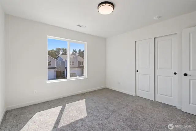 On the opposite side of the house are the other 2 bedrooms, nice and private