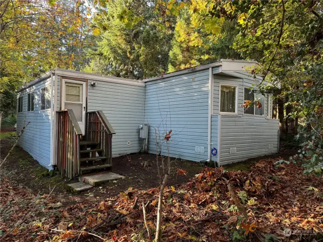 REAR ENTRANCE AND BACK YARD