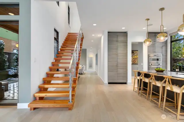 Welcome home! European white oak engineered hardwood floors throughout the home