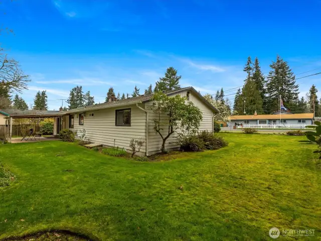 Spacious fenced yard ~ lots of room for recreation and gardening ~