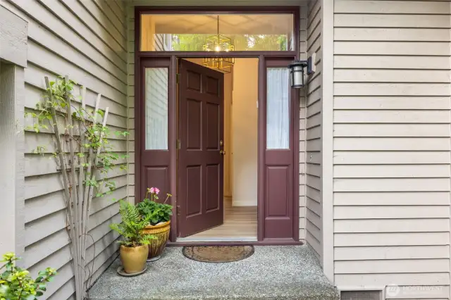 Charming front porch leads into the beautifully updated entryway.