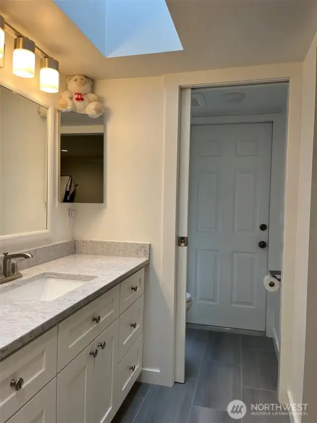 door leads to deck and hot tub area