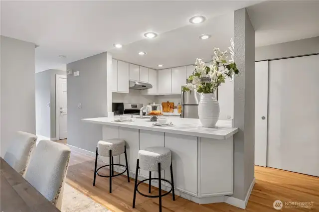 Updated kitchen featuring stainless steel appliances and contemporary finishes