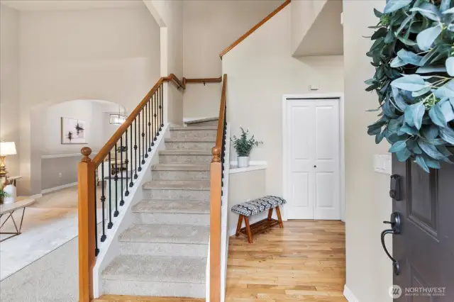 Freshly refinished oak hardwoods and new carpet. Light+ Bright Entry