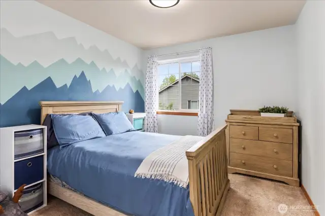 What a sweet mountain mural. This room faces east.