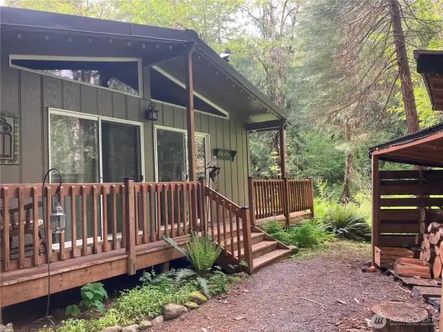 Strolling around to the main bedroom & the woodshed