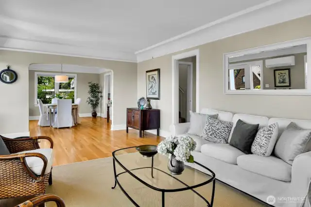 Main living spaces surrounded by huge windows with a private feel. New paint & lighting, as well as updated plumbing & wiring. No knob & tube.