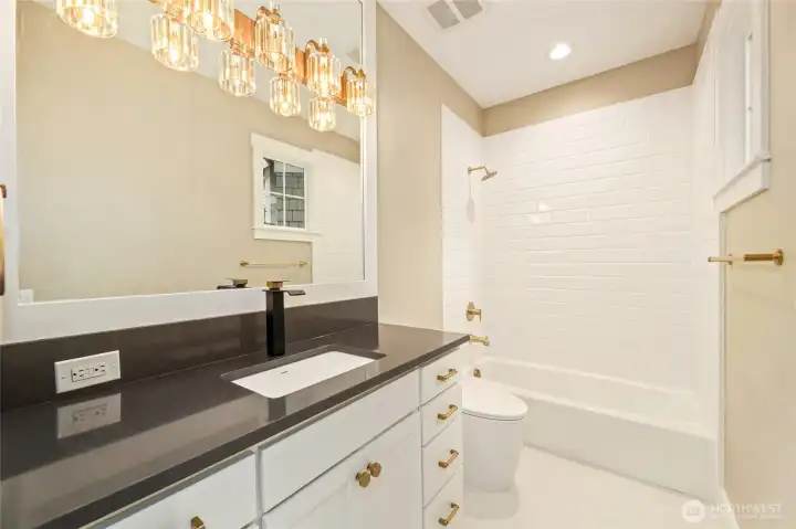 Spacious guest retreat w/private ensuite on the main level.